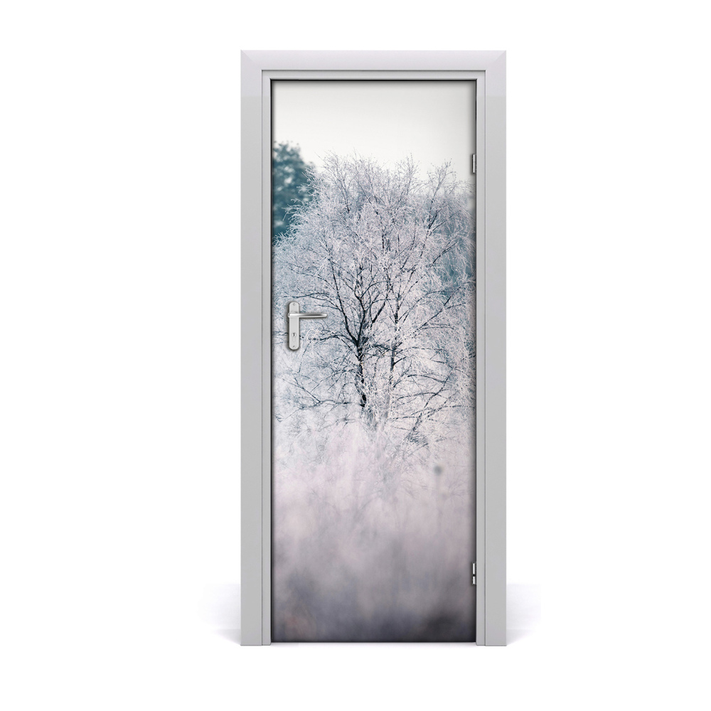 Naklejka na drzwi samoprzylepna Zima las drzewa