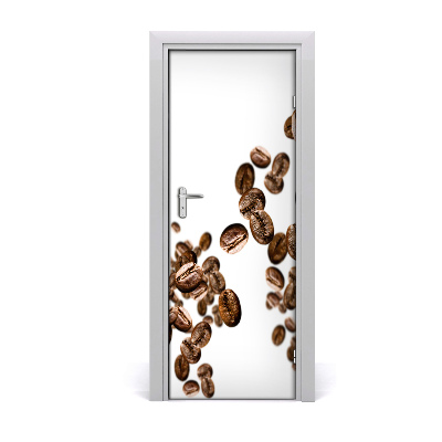 Naklejka na drzwi samoprzylepna Spadające ziarna kawy