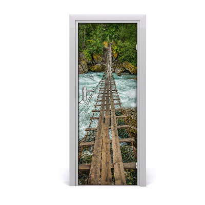 Naklejka fototapeta na drzwi Most wiszący nad rwącym potokiem