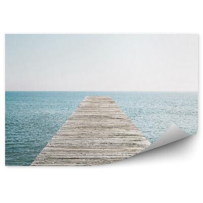Fototapeta samoprzylepna Drewniany pomost woda błękit horyzont