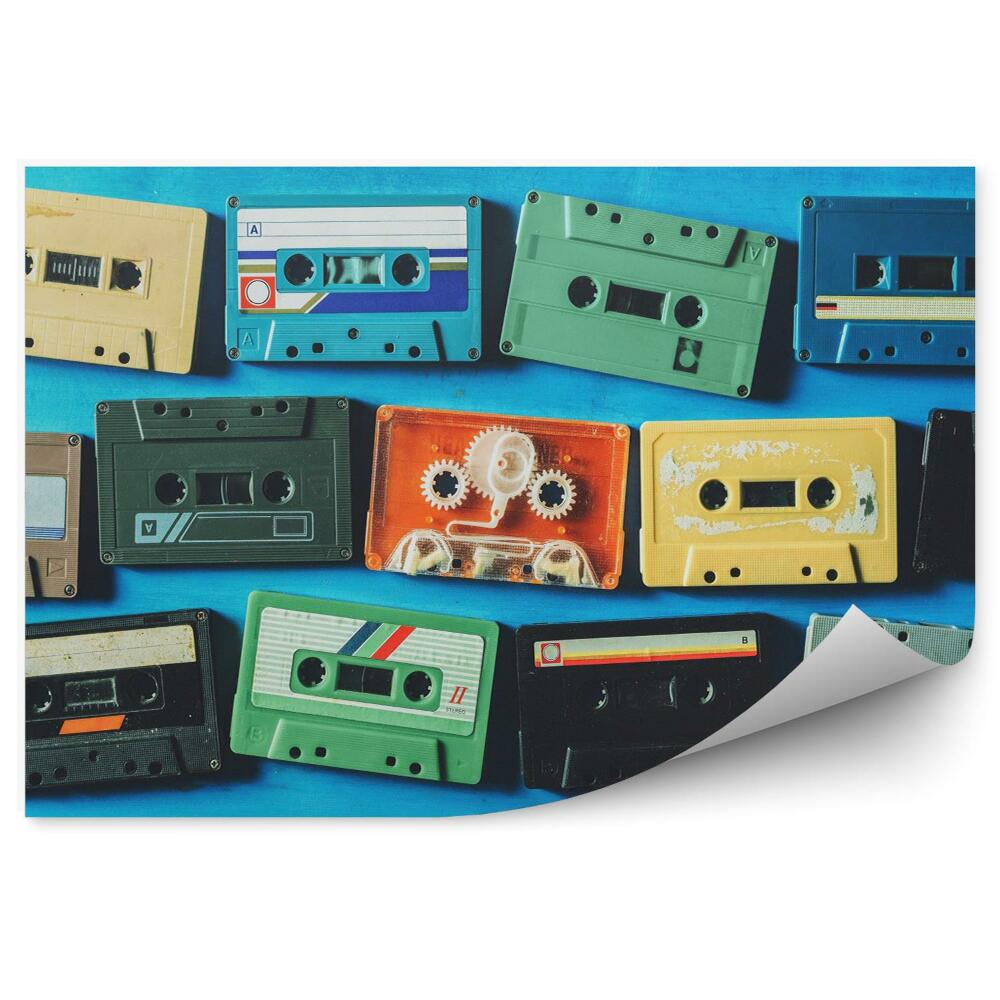 Fototapeta Stare kasety taśmy na niebieskim tle 