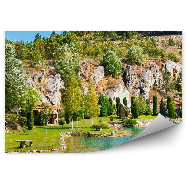 Fototapeta Domek skały drzewa ocean zieleń niebo chmury góry