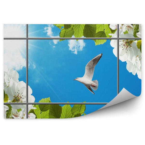 Fototapeta na ścianę Biały ptak kwitnące drzewo błękitne niebo