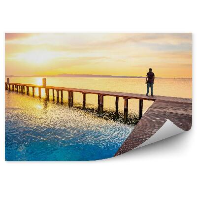 Okleina ścienna Molo człowiek ocean niebo chmury zachód słońca
