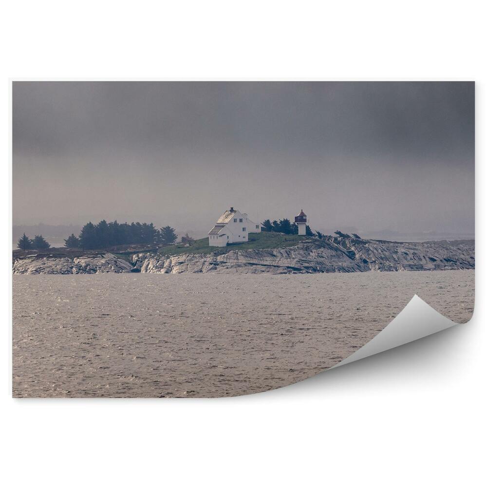 Fotopeta Wyspa latarnia morska dom pochmurne niebo
