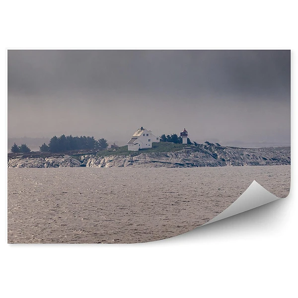 Fotopeta Wyspa latarnia morska dom pochmurne niebo