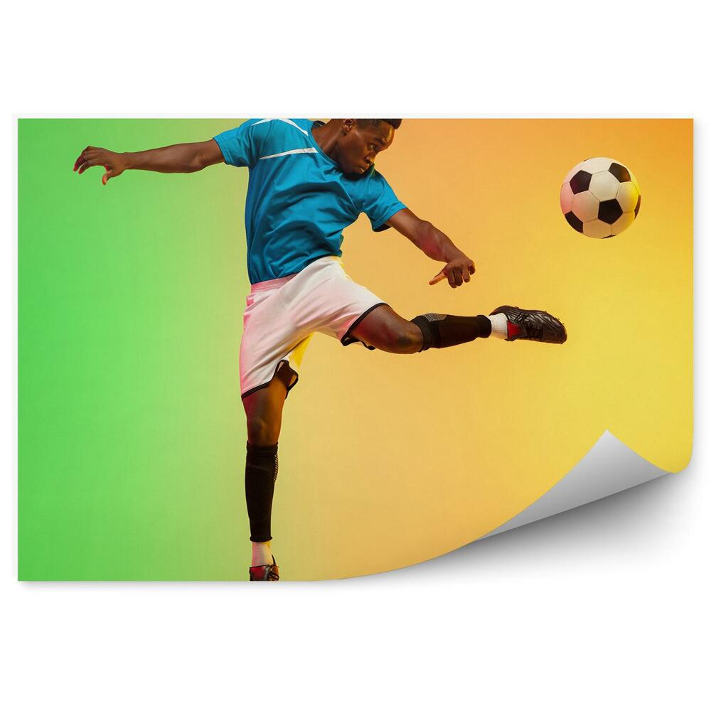 Fototapeta na ścianę Piłkarz zawodnik piłka nożna