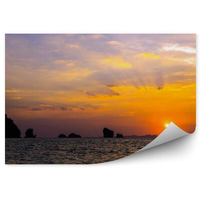 Fototapeta Zachód słońca skały ocean chmury