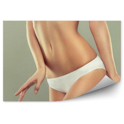 Fotopeta Szczupłe młode ciało bielizna jednolite tło