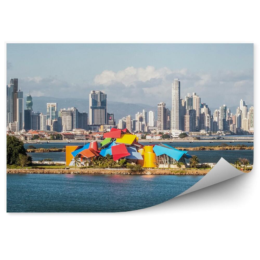 Fototapeta Wieżowce drzewa ocean niebo chmury