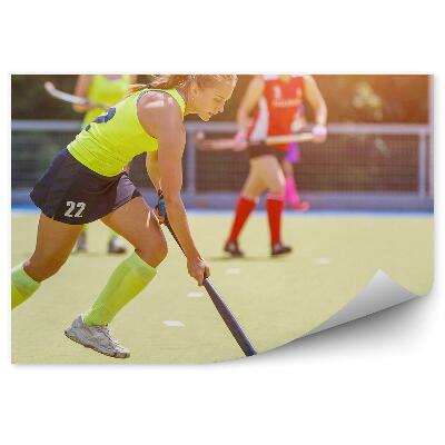 Fototapeta samoprzylepna Hokej na trawie kobieta