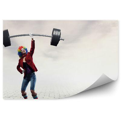 Fototapeta samoprzylepna Klaun kobieta chodnik podnoszenie ciężarów