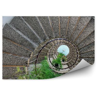 Fototapeta samoprzylepna Włochy spiralne schody w bloku mieszkalnym rośliny