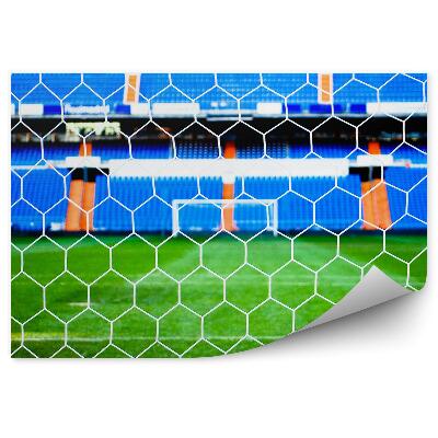 Fototapeta samoprzylepna Murawa siatka krzesła kibiców boisko