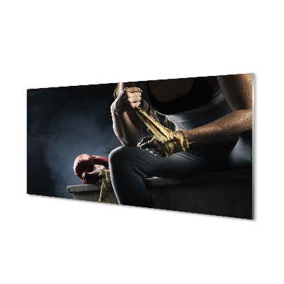 Obraz na szkle Kobieta bandażująca ręce