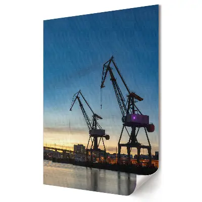 Plakat na materiale polycanvas Zachód słońca nad dźwigami portowymi