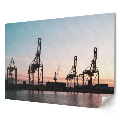 Plakat ścienny premium Portowe dźwigi o zachodzie słońca