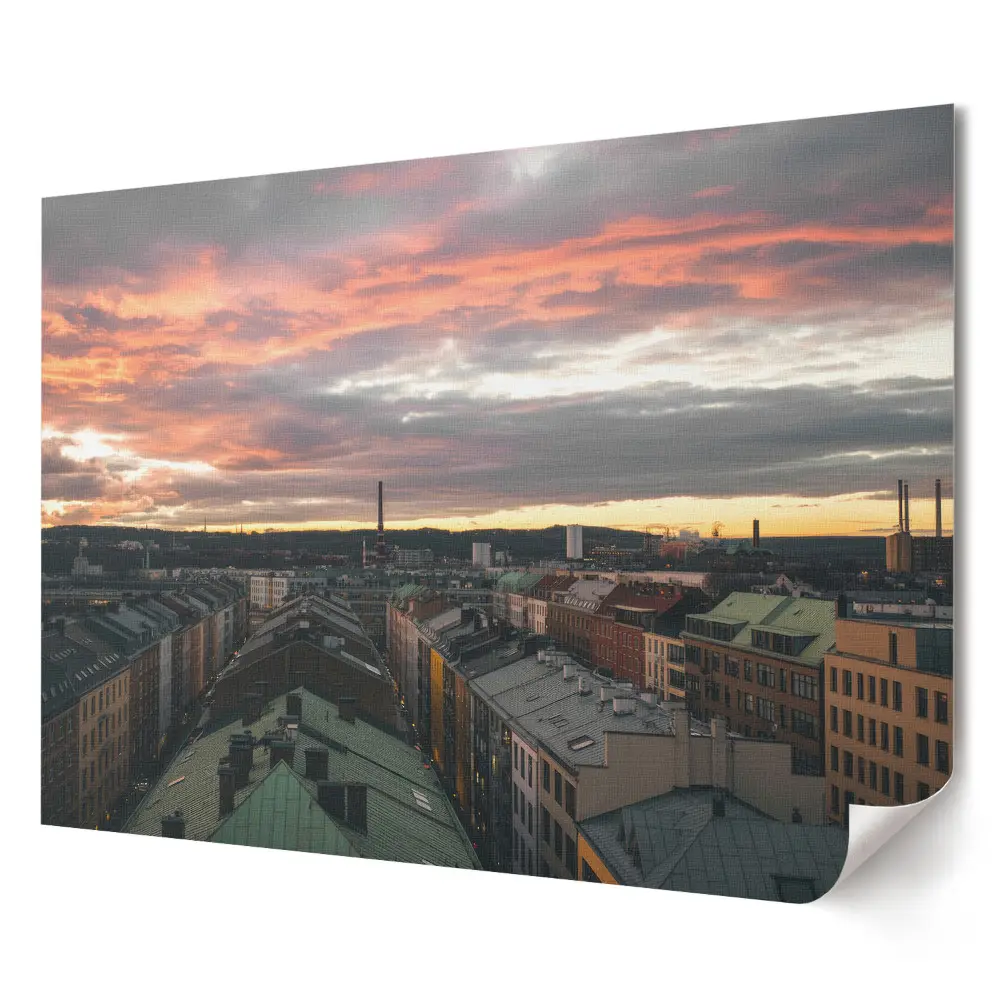 Plakat ścienny premium Zachód słońca nad miastem