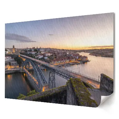 Artystyczny wydruk na płótnie Zachód słońca nad rzeką w Porto