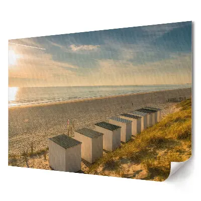 Plakat ścienny premium Spokojny poranek na plaży z domkami