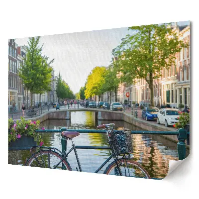 Plakat ścienny premium Rower nad amsterdamskim kanałem w słońcu